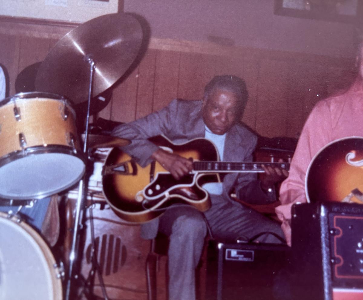 Fran Johnson playing guitar